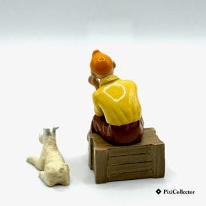 Tintin caisse - PixiCollector.com Pixi figurine Tintin en métal Tintin caisse (réf. 46904) – vue de dos