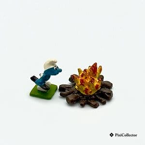 Ensemble de 2 figurines Pixi Schtroumpfs Mini Village en métal « Le Schtroumpf au feu de camp - 2 fig. » (réf. 2709), vue de profil