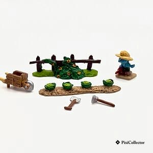 Ensemble de 6 figurines Pixi Schtroumpfs Mini Village en métal « Boîte complémentaire Schtroumpf Jardinier - 6 fig. » (réf. 2704), vue de face